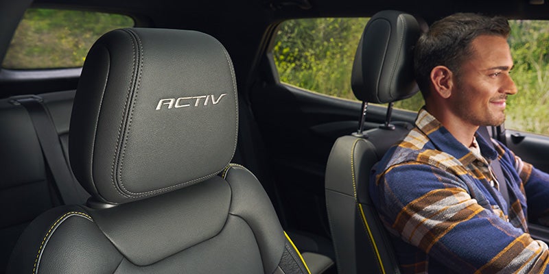 man driving Chevrolet Trailblazer