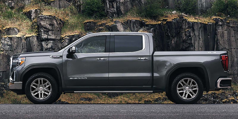 side view of silver GMC Sierra 1500